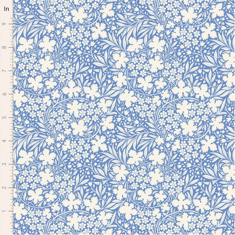 TIlda Something Blue Bushbloom Blue. Floral patterned fabric with white flowers on a blue background.
