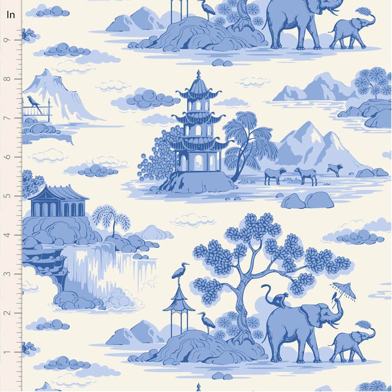 Tilda Something Blue Cottonview Cream. Fabric with blue and white landscape design featuring elephants, pagodas, and trees.