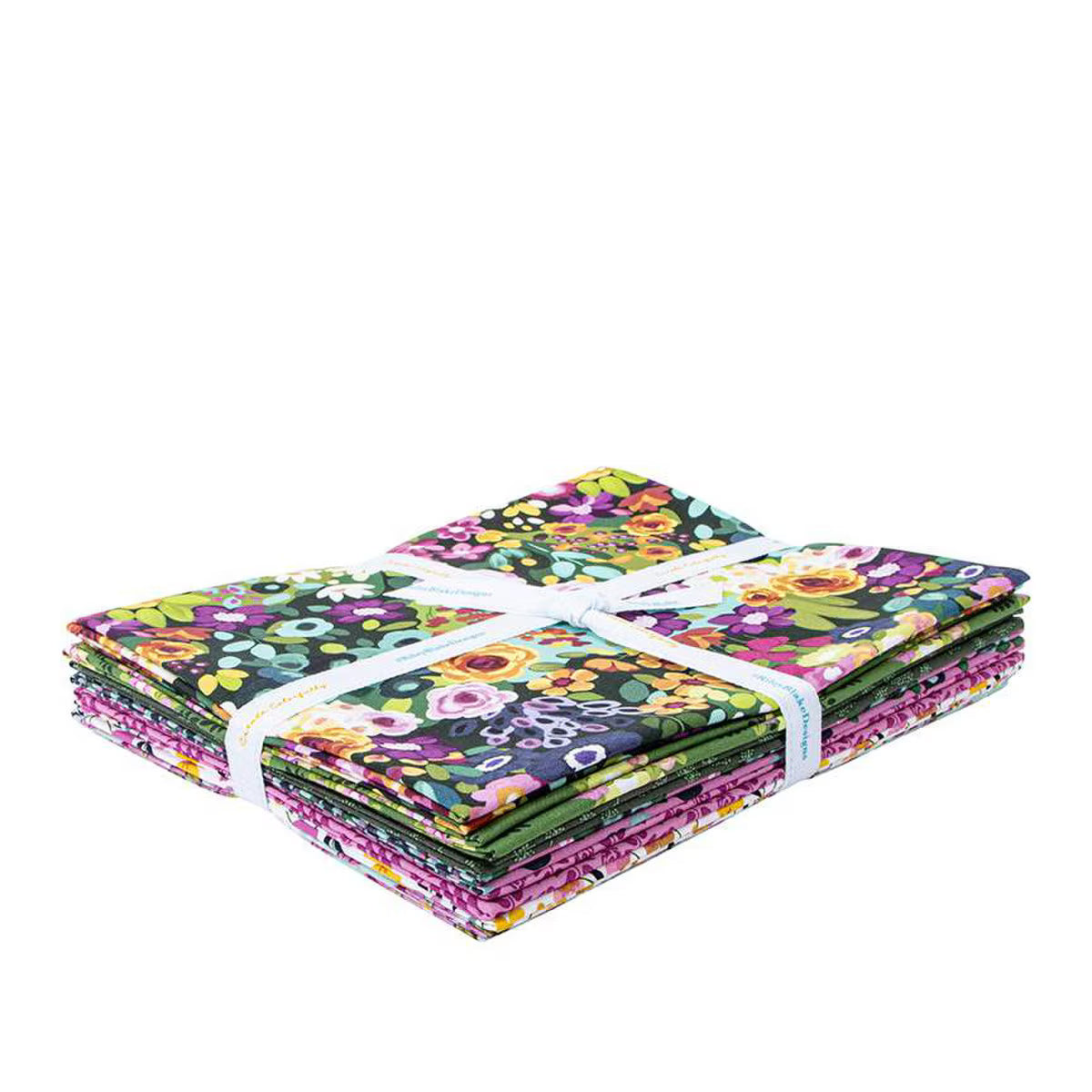 Stack of floral fabric bundles tied together on a white background