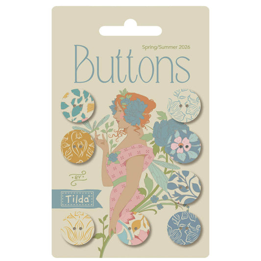 Packaging of Tilda buttons Spring/Summer 2026 design on a beige background