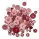 Collection of pink and red buttons on a white background
