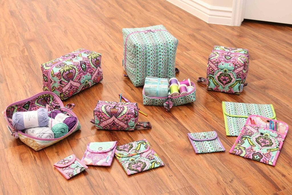 Cubicle Collective organizer sewing pattern by ByAnnie featuring multiple storage pockets for sewing, crafting, and office supplies in Tula Pink fabric.