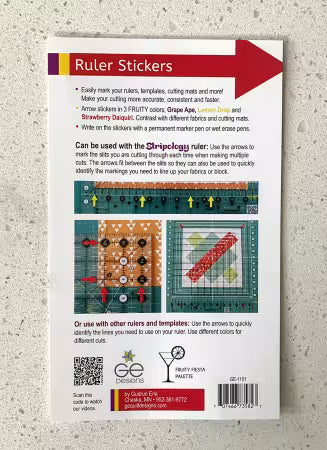 Ruler stickers packaging with text and graphics on a textured surface