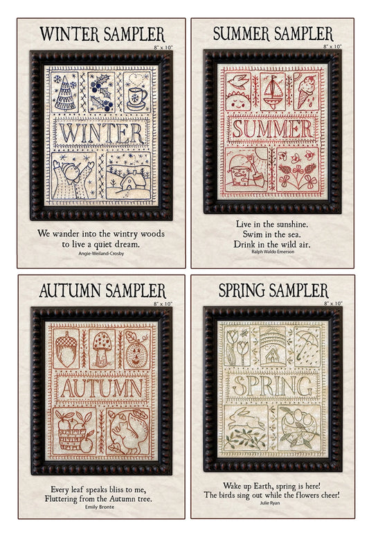 Four sampler prints for winter, summer, autumn, and spring with black frames and text.