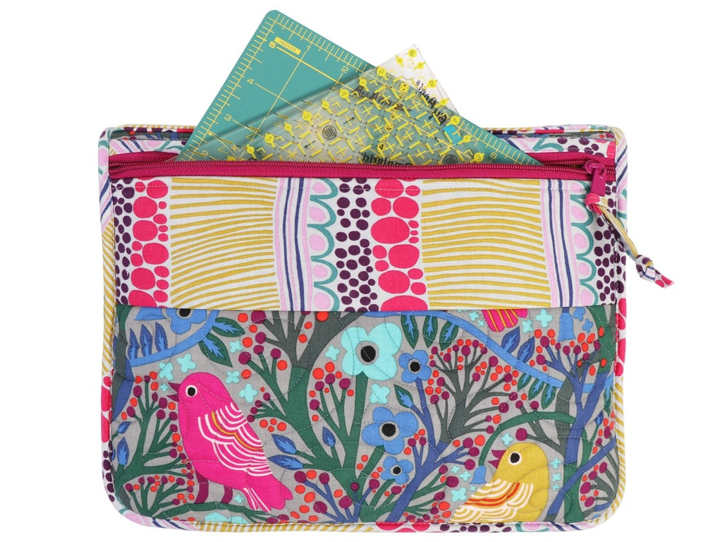 Colorful patterned pouch with birds and flowers on a white background
