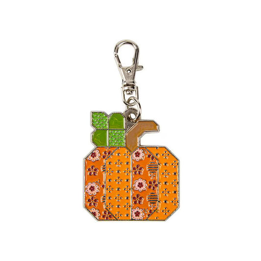 Riley Blake Pumpkin-shaped keychain with floral patterns on a white background