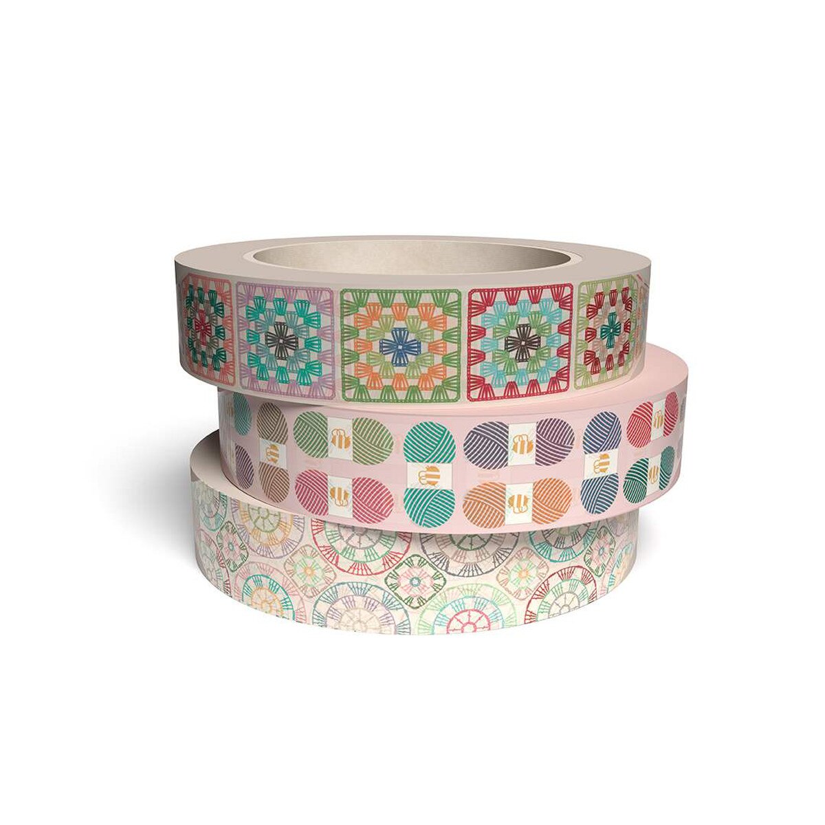Three rolls of decorative tape with colorful patterns on a white background