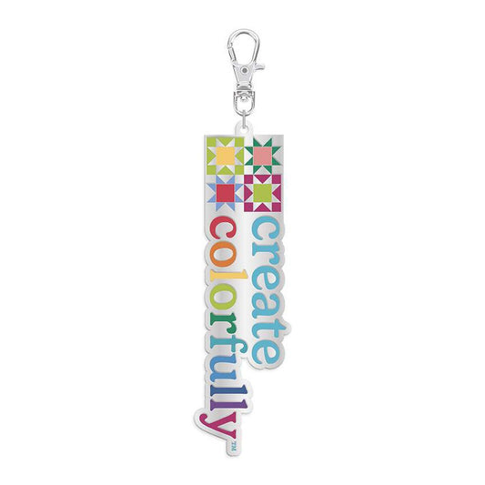 Colorful keychain with 'create colorfully' text on a white background