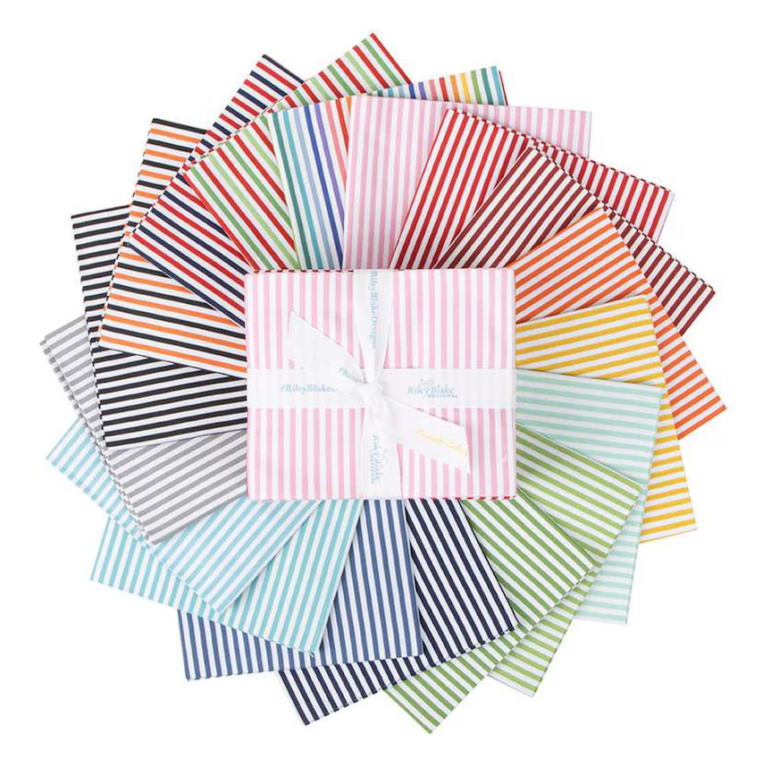 Collection of colorful striped fabric panels arranged in a circular pattern on a white background.
