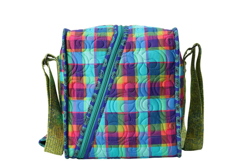 Stitcher's Suitcase sewing pattern by ByAnnie featuring a portable fabric organizer with pockets and compartments for sewing tools, notions, thread, and craft supplies. Side zipper