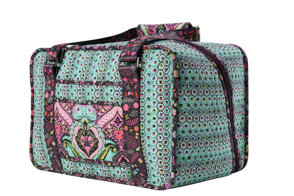 Stitcher's Suitcase sewing pattern by ByAnnie featuring a portable fabric organizer with pockets and compartments for sewing tools, notions, thread, and craft supplies. Side shot