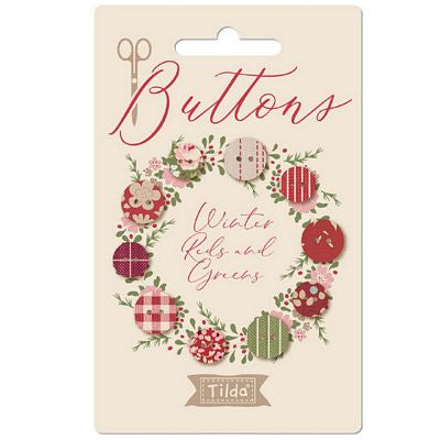Packaging of Tilda buttons with floral design and text on a beige background