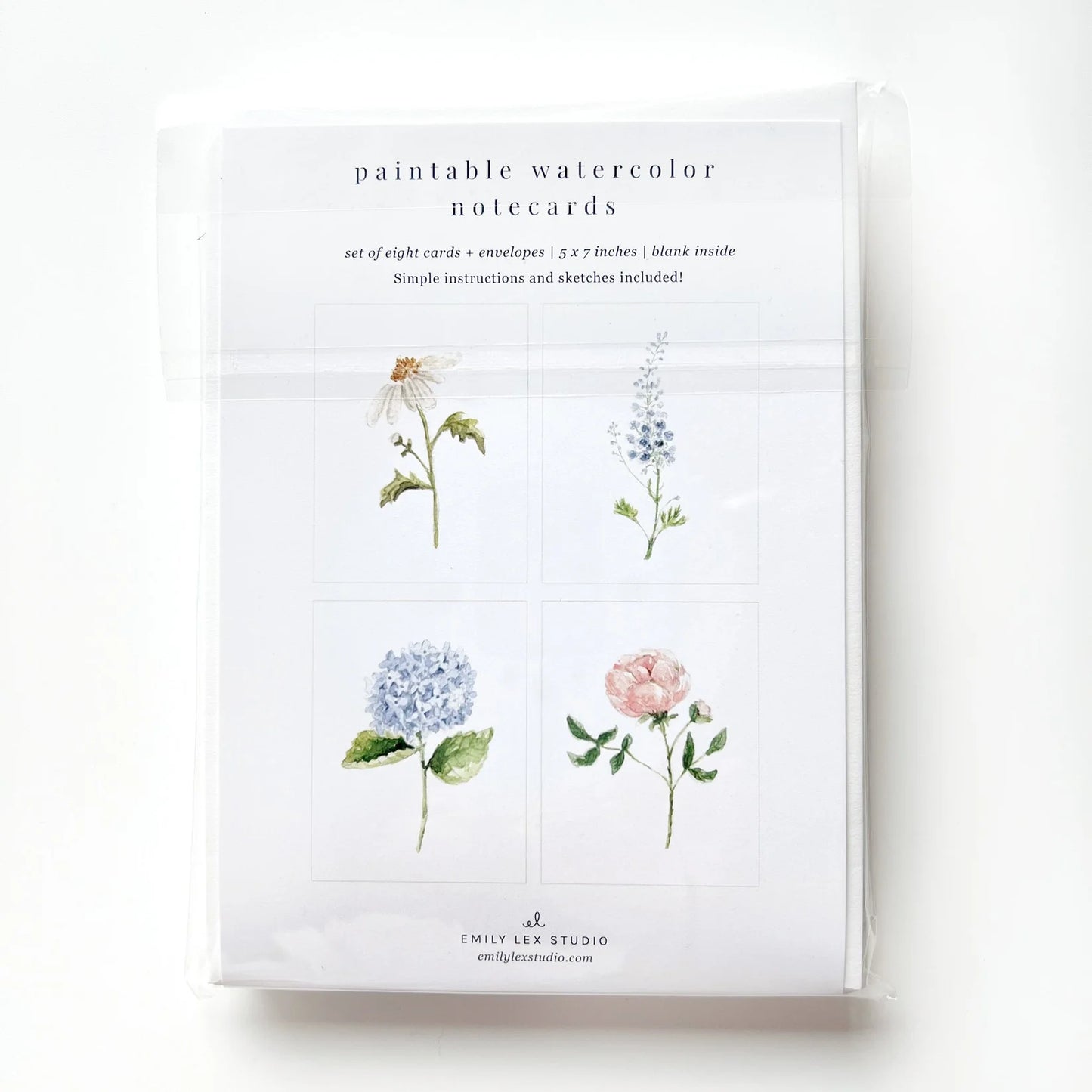 Pack of paintable watercolor notecards with floral designs on a white background